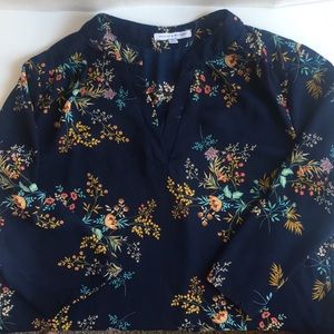 Blue long sleeved floral blouse